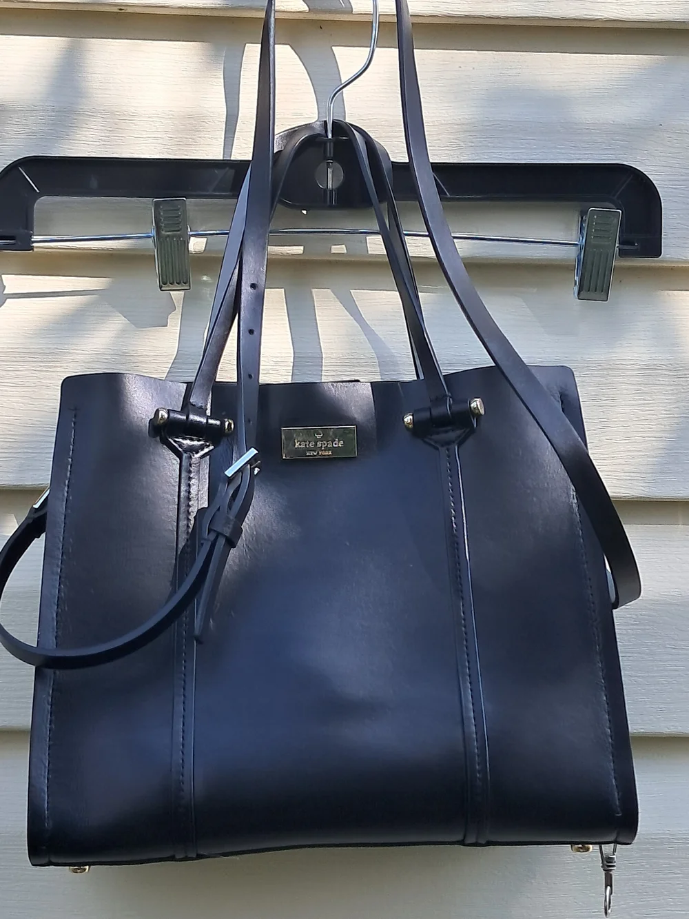 Kate Spade New York black leather tote bag with shoulder strap​